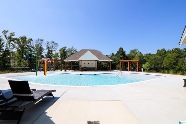 view of pool with a patio area