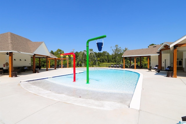 view of swimming pool featuring a patio