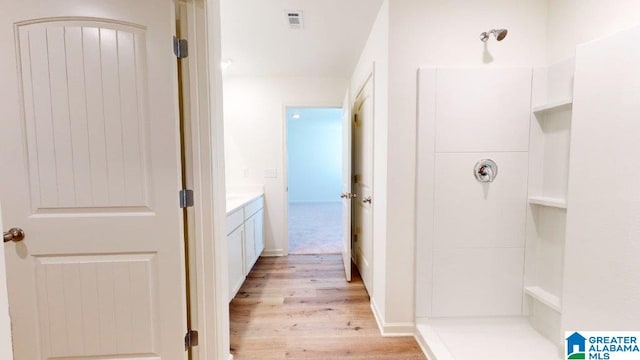 hall with light hardwood / wood-style floors