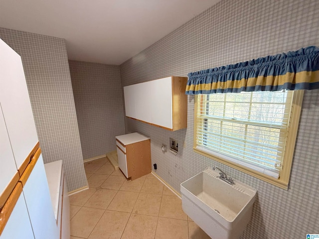 bathroom featuring tile patterned flooring and sink