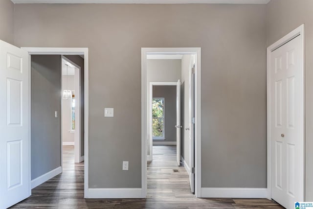 unfurnished bedroom featuring dark hardwood / wood-style floors