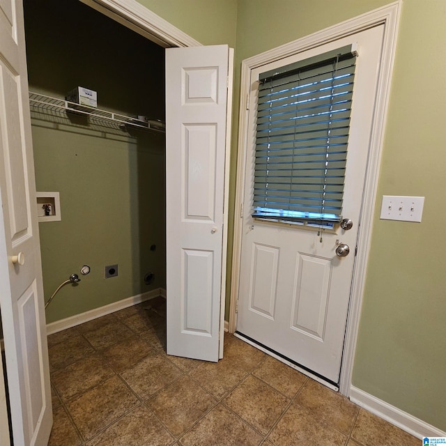 laundry room with hookup for an electric dryer, tile patterned floors, and hookup for a washing machine