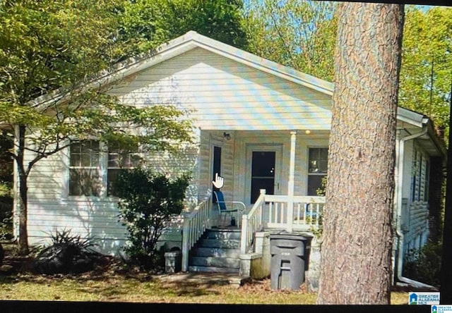 view of front of home featuring covered porch