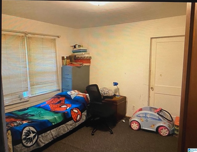 bedroom featuring carpet floors