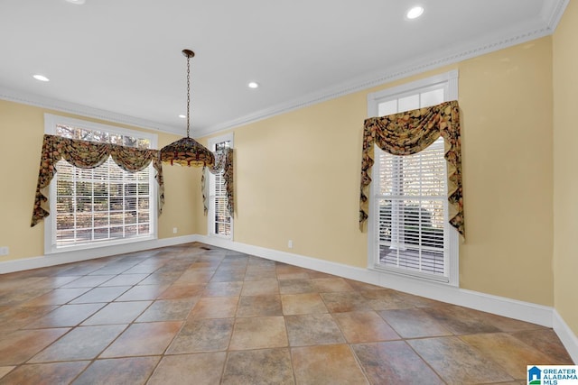 unfurnished dining area with crown molding and a wealth of natural light