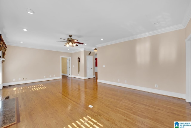 unfurnished living room with light hardwood / wood-style floors, ceiling fan, and crown molding