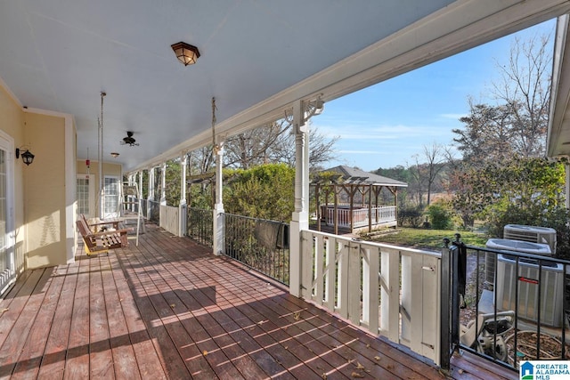 wooden deck with a gazebo