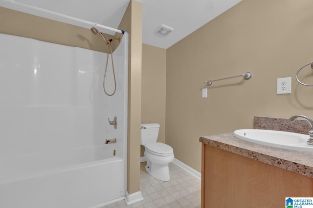 full bathroom with washtub / shower combination, vanity, and toilet