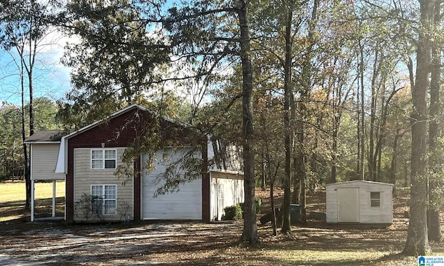 exterior space featuring a shed