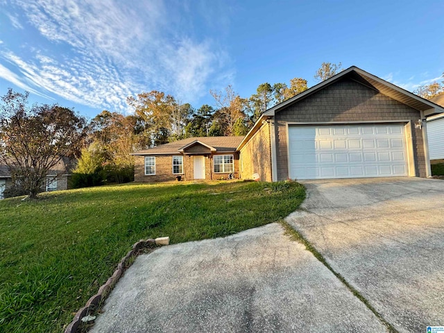 ranch-style house with a front yard and a garage