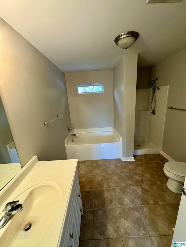 full bathroom with tile patterned floors, vanity, separate shower and tub, and toilet