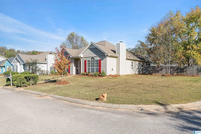 view of front of home featuring a front lawn