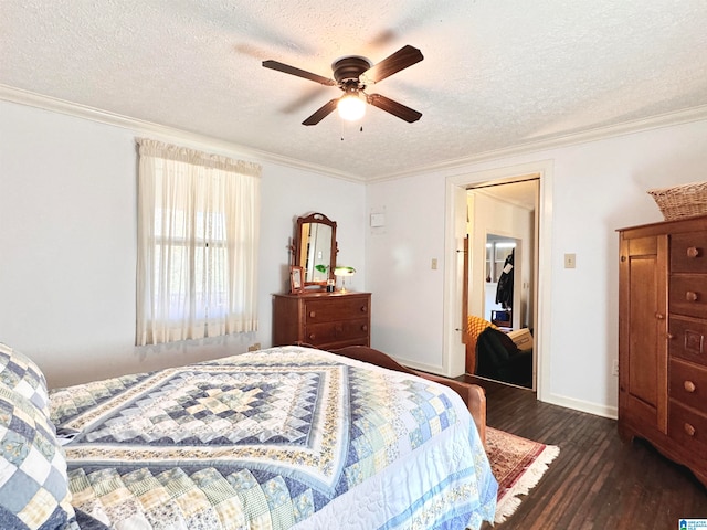 bedroom with ceiling fan, dark hardwood / wood-style flooring, crown molding, and a textured ceiling