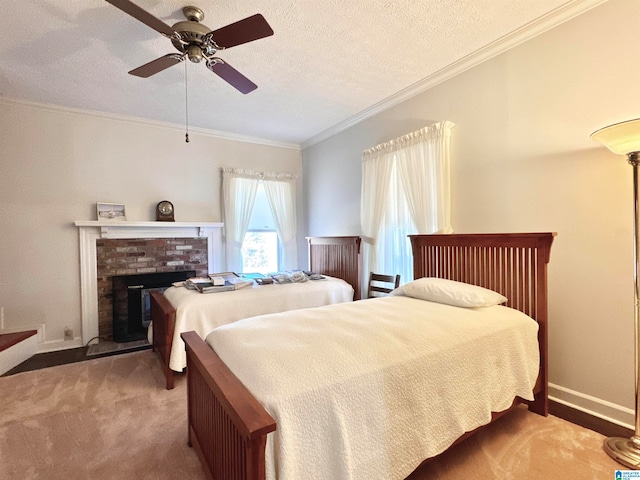 carpeted bedroom with ceiling fan, crown molding, and a textured ceiling