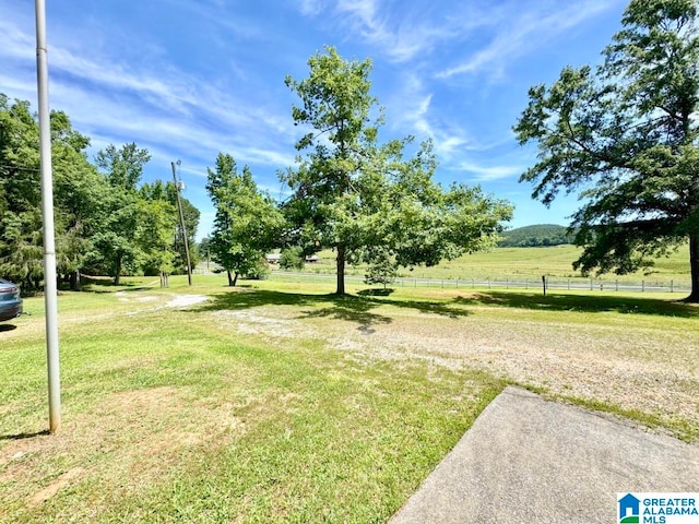 exterior space with a rural view