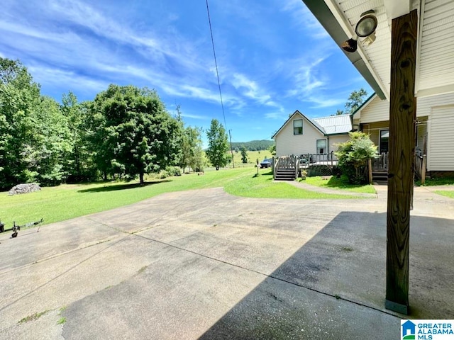 view of patio / terrace featuring a wooden deck