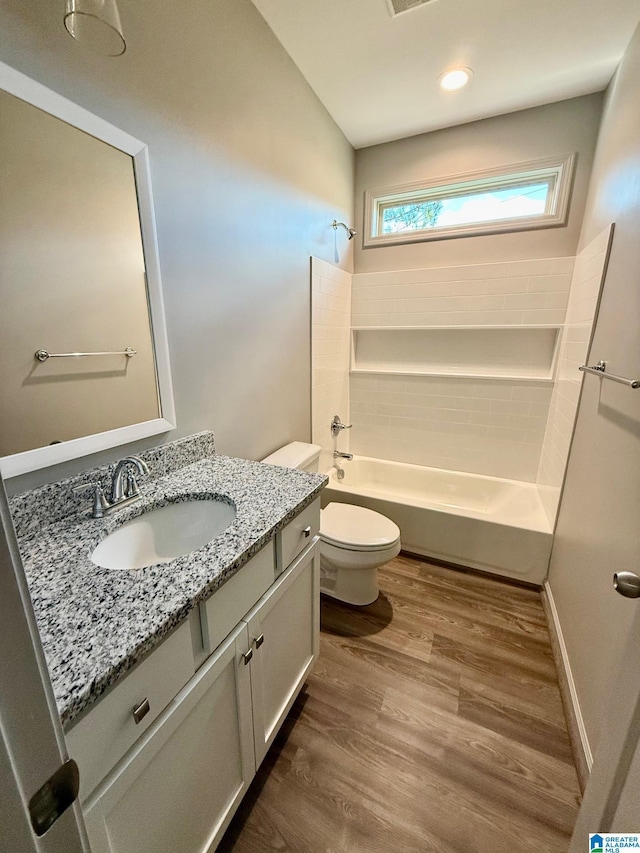 9225 Jardin Cir, Leeds, AL 35094 - bathroom featuring vanity, toilet, wood finished floors, shower / bathtub combination, and recessed lighting