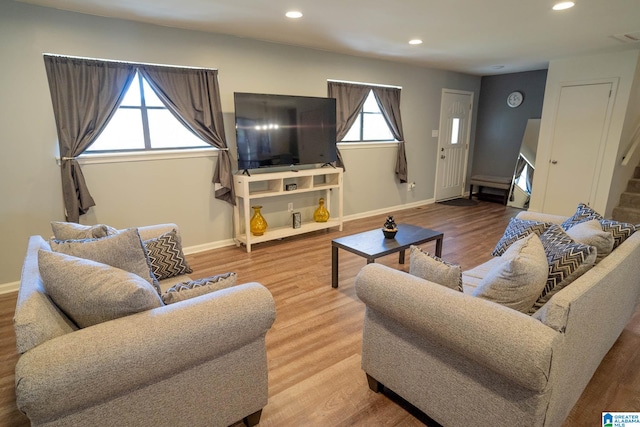 living room with light hardwood / wood-style floors