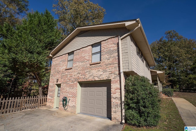 view of property exterior featuring a garage