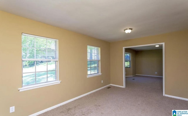 view of carpeted spare room