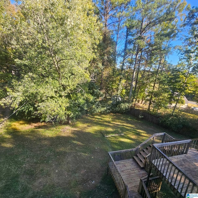 view of yard with a wooden deck