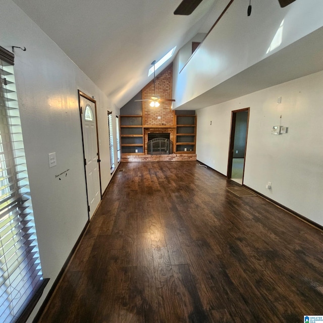 unfurnished living room featuring dark hardwood / wood-style flooring, ceiling fan, a fireplace, and high vaulted ceiling