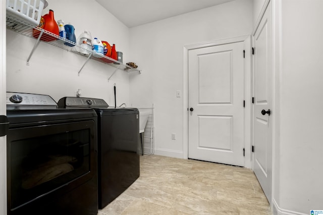 laundry area featuring separate washer and dryer