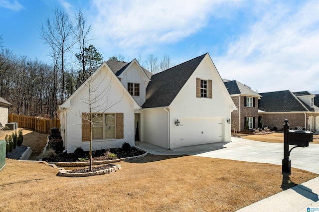 view of front of house featuring a front yard and a garage