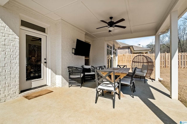 view of patio / terrace featuring ceiling fan