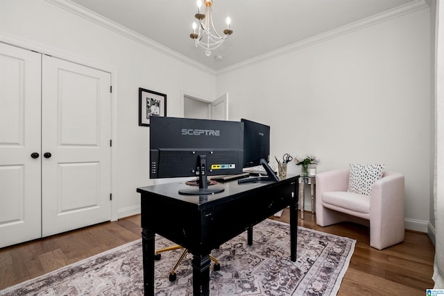 office space with wood-type flooring, an inviting chandelier, and crown molding