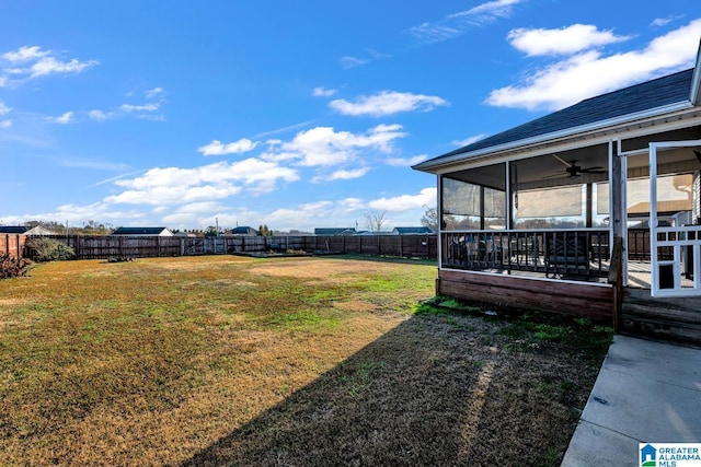 view of yard featuring a sunroom