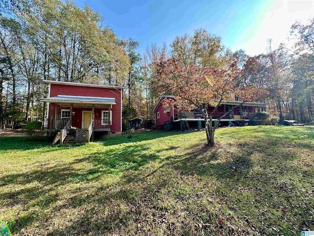 view of yard featuring a porch