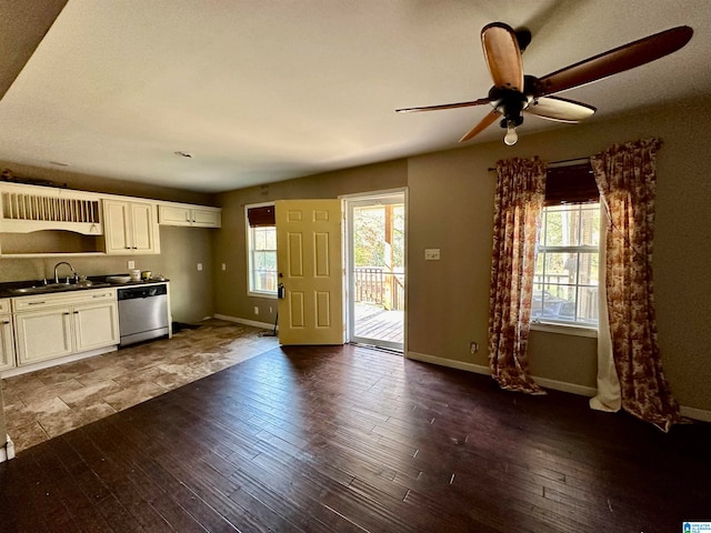 kitchen with ceiling fan, sink, dishwasher, dark hardwood / wood-style floors, and white cabinetry