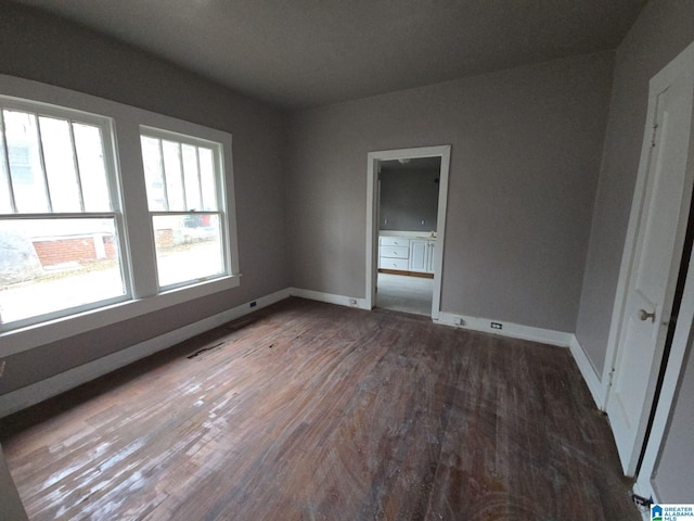 8035 4th Ave S, Birmingham, AL 35206 - empty room featuring wood finished floors and baseboards