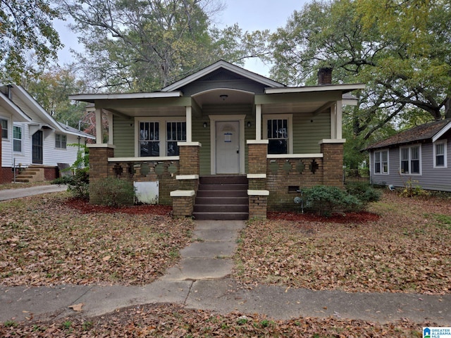 bungalow-style home with a porch