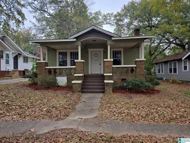 8035 4th Ave S, Birmingham, AL 35206 - view of front of house featuring a chimney and covered porch