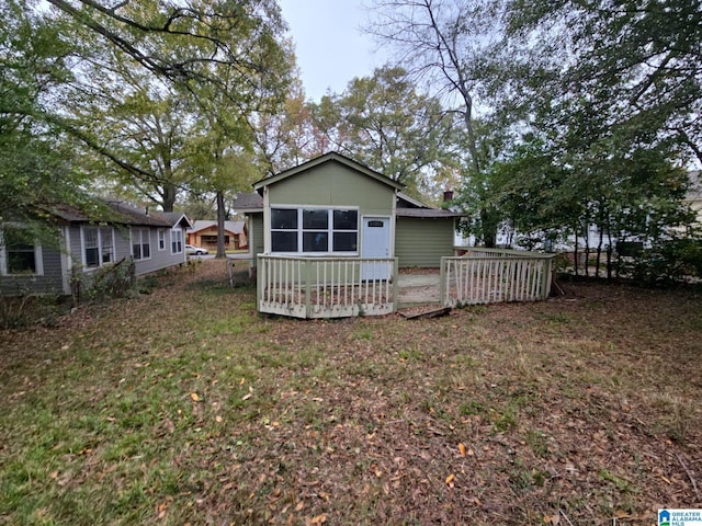 8035 4th Ave S, Birmingham, AL 35206 - rear view of house with a wooden deck