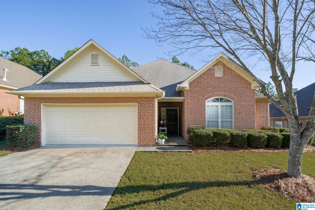 view of front of house featuring a garage and a front yard