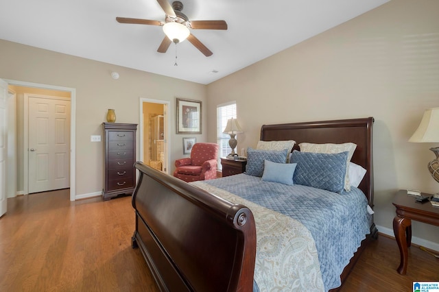 bedroom featuring ceiling fan, hardwood / wood-style floors, and ensuite bathroom