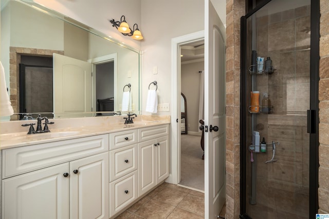 bathroom with vanity, tile patterned floors, and an enclosed shower