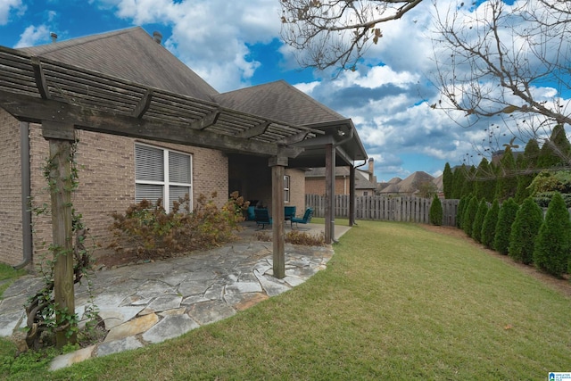 view of yard featuring a pergola and a patio