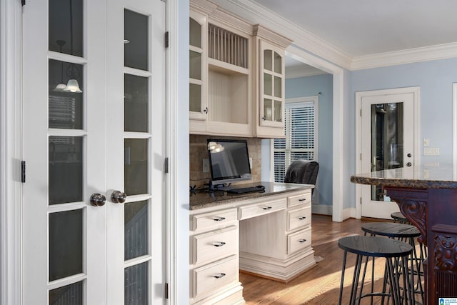 office area with crown molding and dark hardwood / wood-style floors