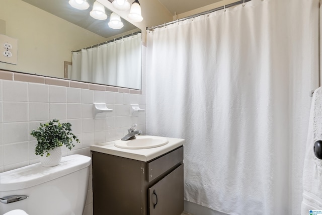 bathroom featuring a shower with curtain, toilet, decorative backsplash, vanity, and tile walls