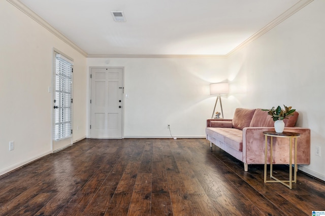 living area with crown molding and dark wood-type flooring