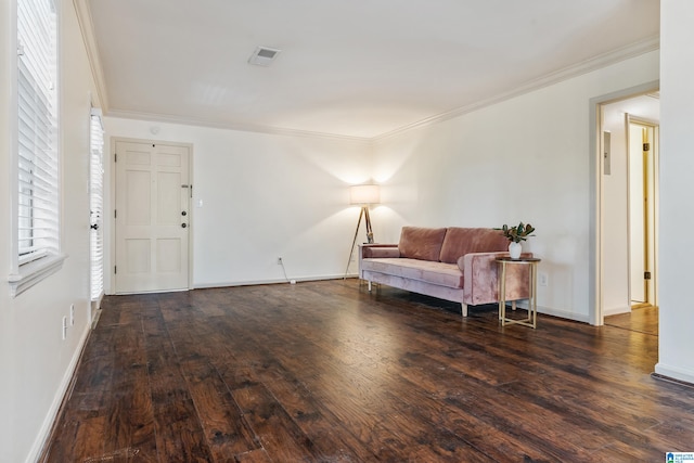 sitting room featuring dark hardwood / wood-style flooring and ornamental molding