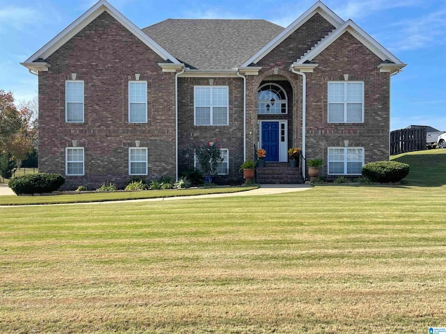 view of front of house with a front lawn