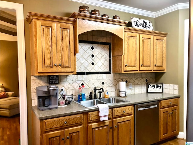 kitchen with backsplash, crown molding, sink, wood-type flooring, and dishwasher