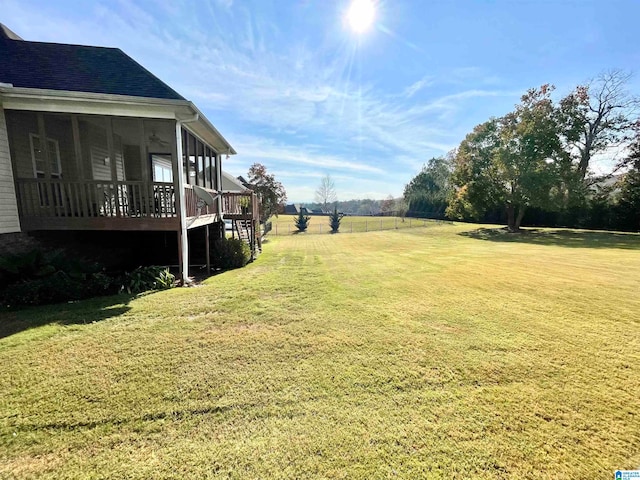 view of yard with a sunroom