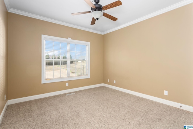 unfurnished room with carpet floors, ceiling fan, and ornamental molding