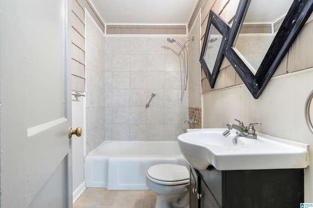 full bathroom with tile patterned floors, vanity, toilet, and tiled shower / bath